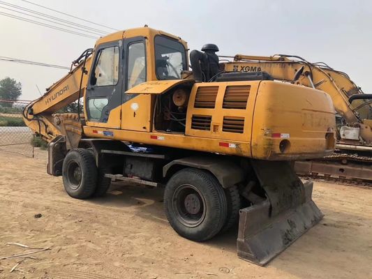 Excavateur à roues Hyundai 210W en excellent état avec moteur original