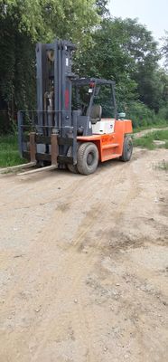 TCM FD70 camion élévateur usé en bon état poids 7000 kg moteur diesel source de puissance